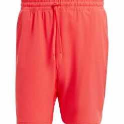 adidas Tennis<· Ergo 7IN semi lucid red