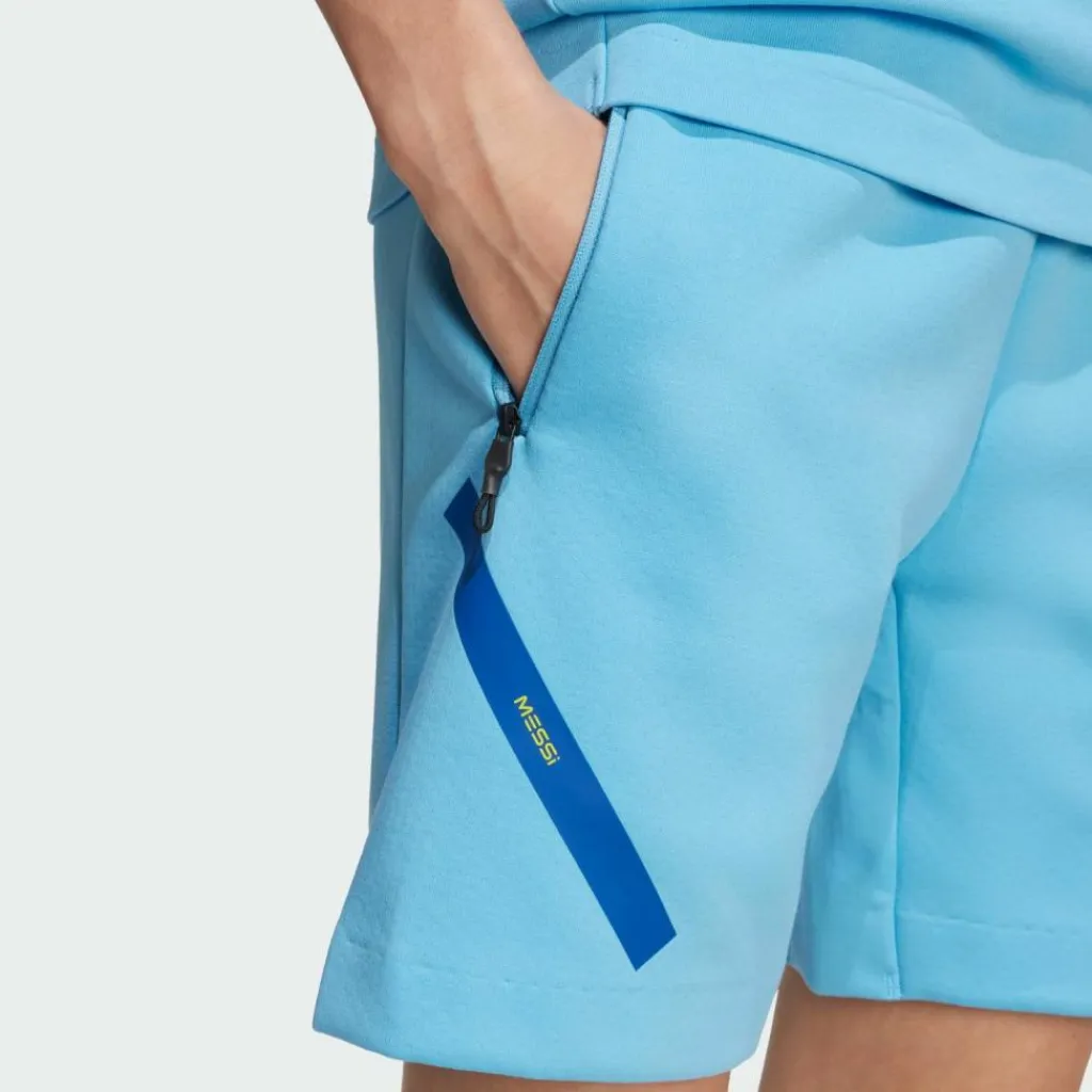 adidas Shorts<· MESSI ZNE SHORTS FÜR KINDER Semi Blue Burst / Semi Solar Yellow