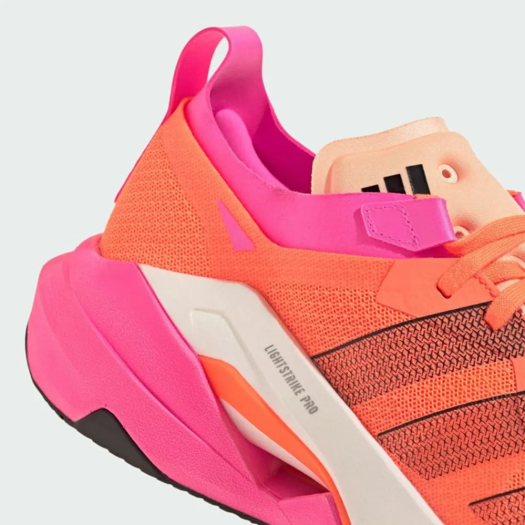 adidas Fitnessschuhe<· Rapidmove Pro Trainingsschuh Lucid Orange / Core Black / Lucid Pink