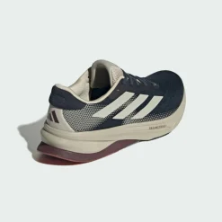 adidas Laufschuhe<· Supernova Solution 2.0 Laufschuh Aurora Ink / Beige / Aurora Ruby