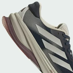 adidas Laufschuhe<· Supernova Solution 2.0 Laufschuh Aurora Ink / Beige / Aurora Ruby