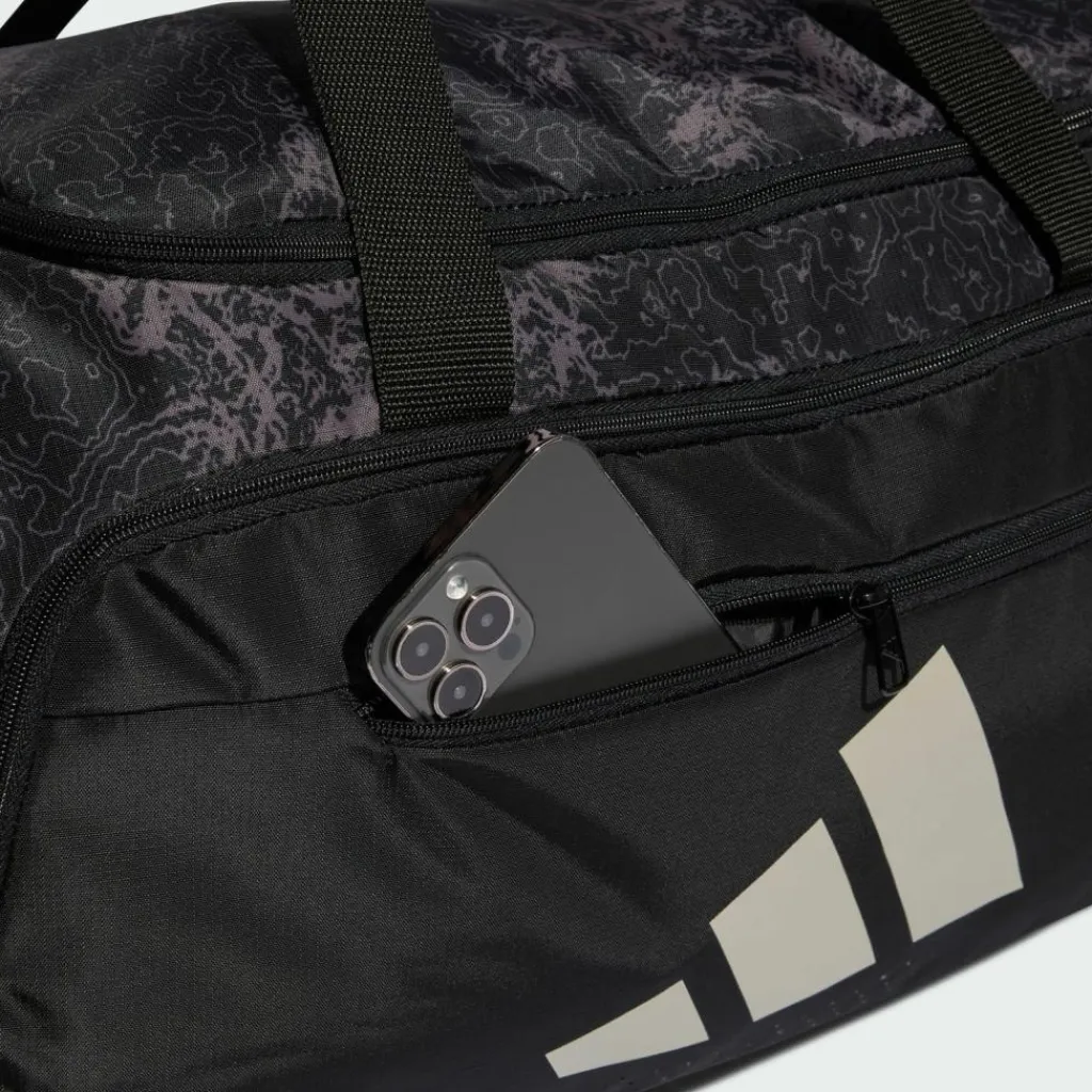 Online · TRAINING DEFENDER DUFFELBAG MITTELGROSS Sporttaschen