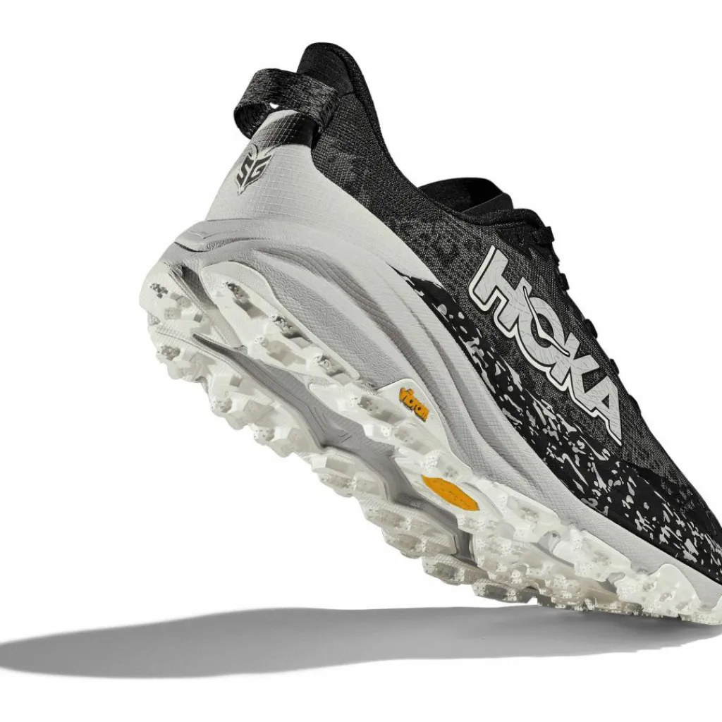 HOKA Trailrunning<· Speedgoat 6 black-stardust