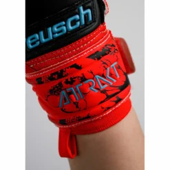 Reusch Handschuhe<· Attrakt Silver Junior orange