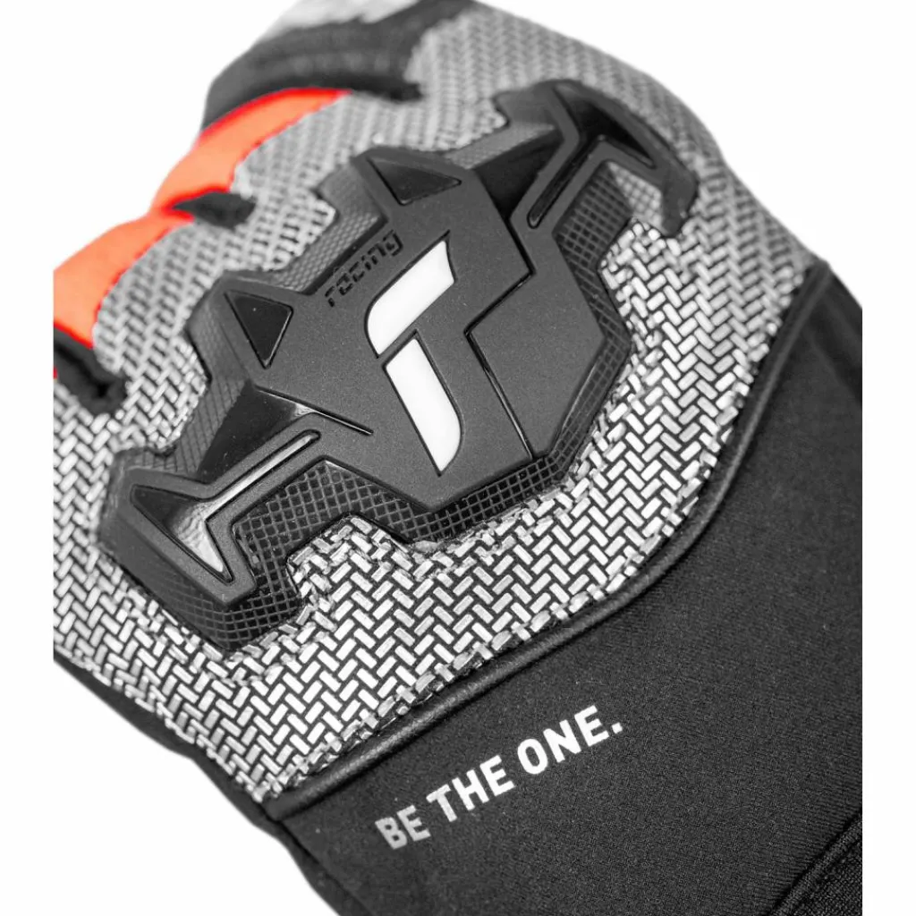 Reusch Snowboarding|Ski<· Worldcup Warrior R-TEX® XT Junior 7588 blck/silver/fluo red